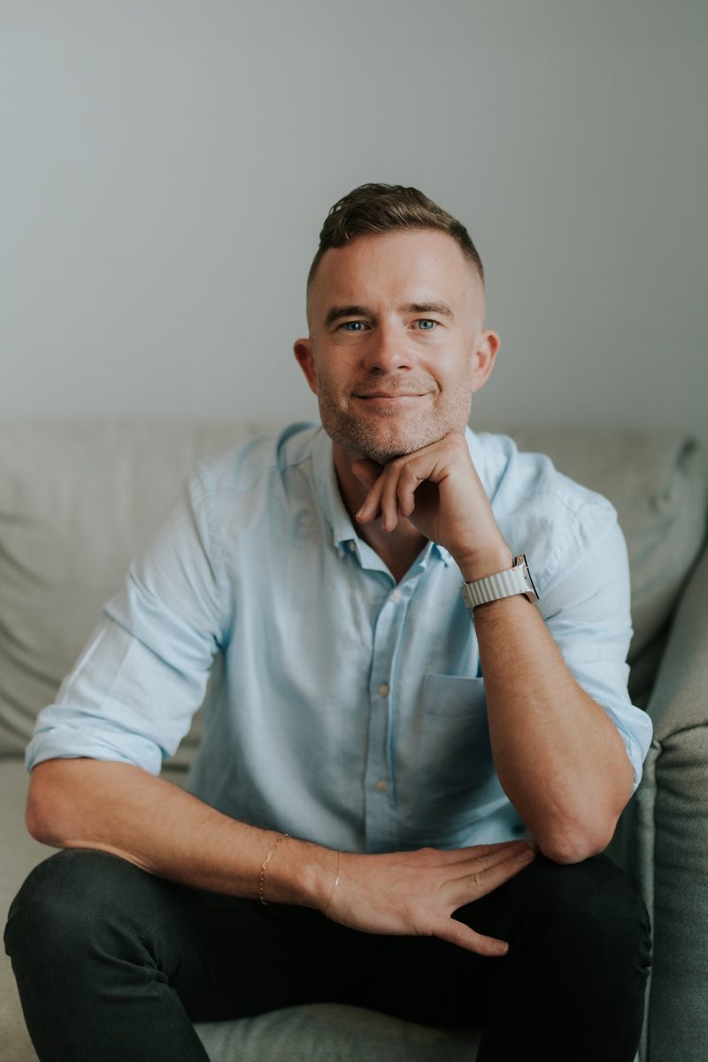 Lachlan Beaton, Clinical Psychologist, seated in his office in Coffs Harbour